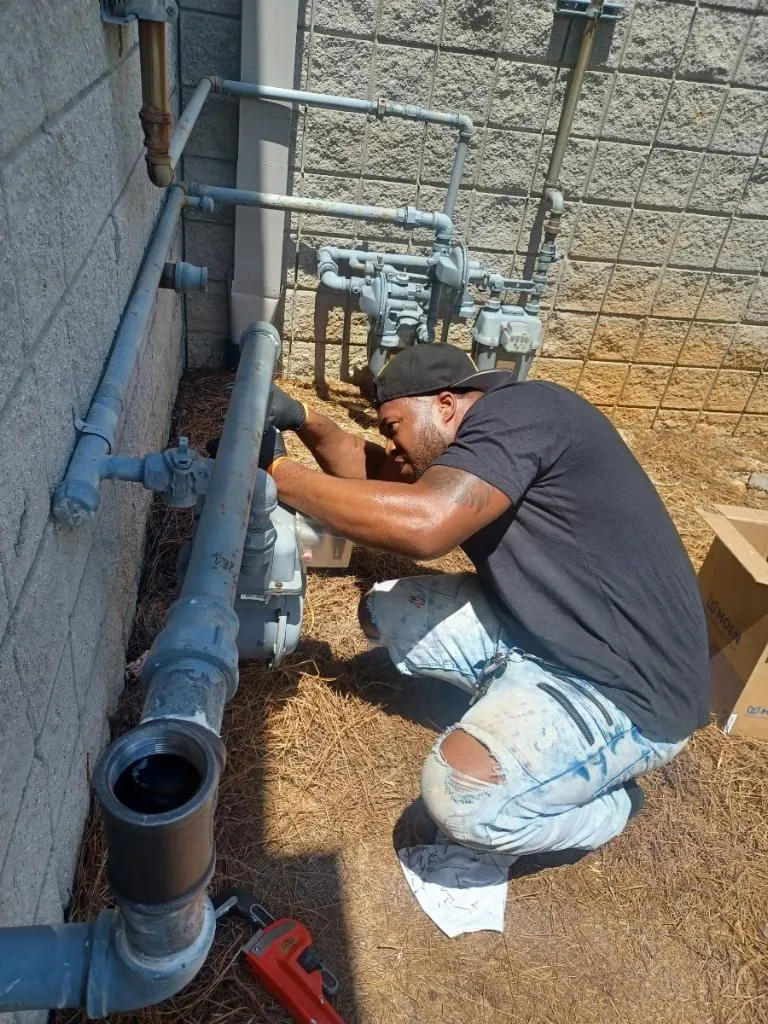 Licensed plumber performing gas line installation in Atlanta